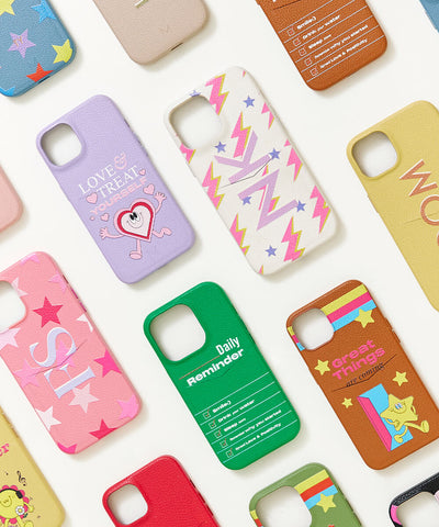 Colorful iPhone cases stacked face down with personalization