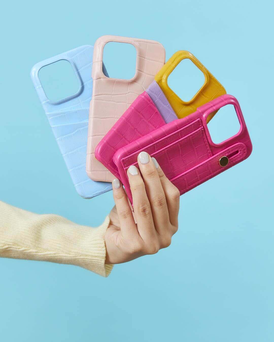 iPhone case with card holder and strap in baby blue, blush pink, hot pink and multicolor cover case