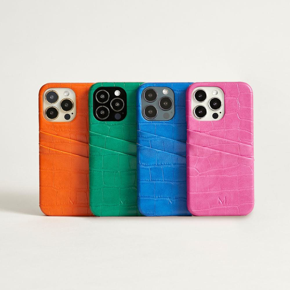 iPhone 14 Pro Max Phone Case with Card Holder in pink displayed in orange, green, blue and pink color