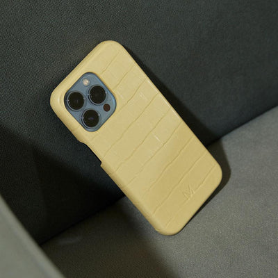 iPhone 14 Phone Cases made from croc vegan leather in pastel yellow color